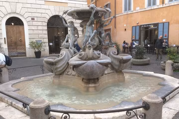The Turtle Fountain in Rome's Jewish Ghetto, showcasing Renaissance art and culture during a culinary walking tour.