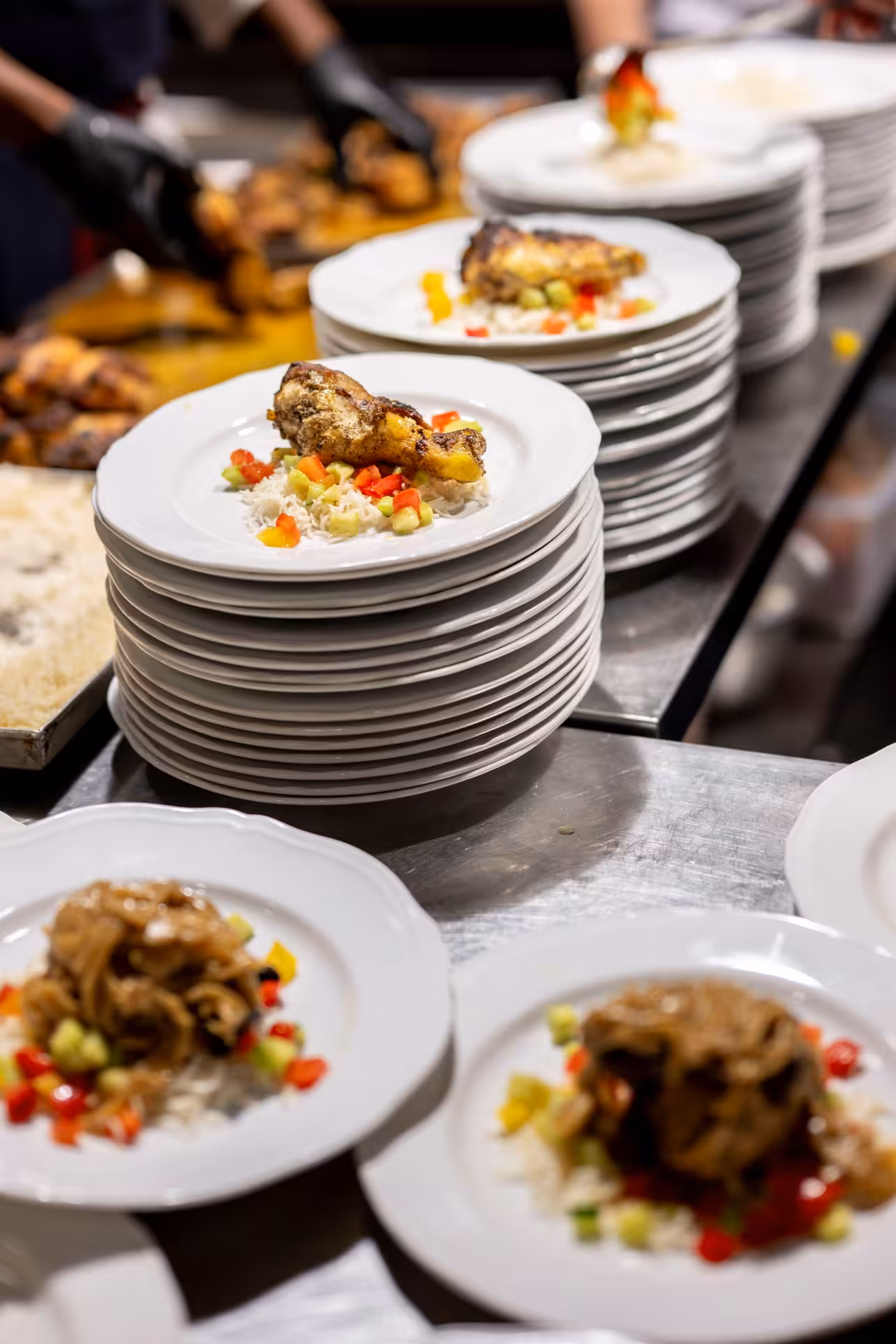Plated Tuscan dinner buffet at Florence Teatro del Sale, featuring roasted chicken with rice and vegetables