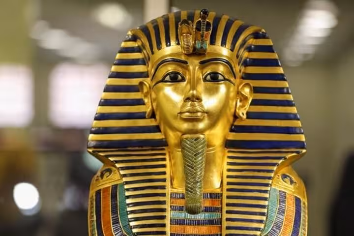 Tutankhamun golden mask at the Grand Egyptian Museum, key stop on semi-private Cairo tour from Hurghada