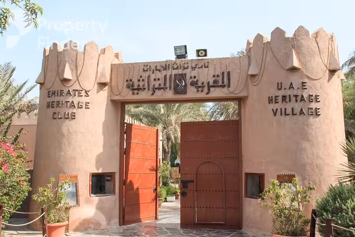 UAE Heritage Village entrance gate in Abu Dhabi, cultural stop on private full-day city tour from Abu Dhabi