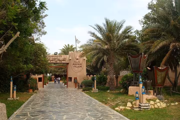 Entrance walkway to UAE Heritage Village, a top stop on a private full-day Abu Dhabi city tour