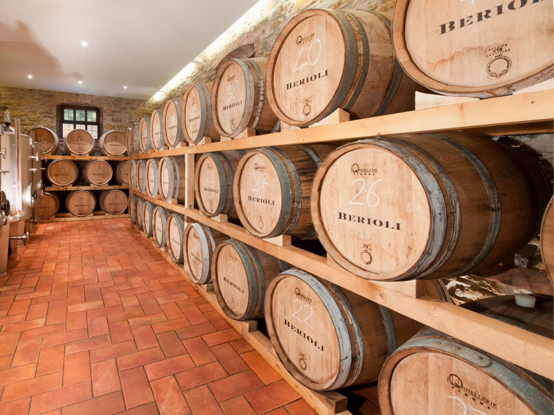 Oak barrel cellar at an Umbria winery near Lake Trasimeno, part of the Perugia wine tour and tasting