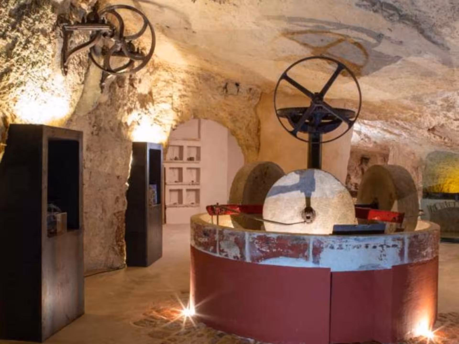Underground olive mill tour near Alberobello & Ostuni with historic stone grinder and extra virgin olive oil tasting
