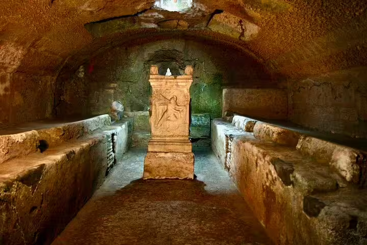 Ancient underground chamber beneath Rome’s San Clemente Basilica with central pagan altar explored on private no-line tour
