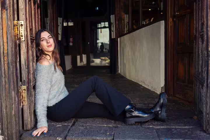 Urban portrait from private Tenerife photoshoot with professional photographer in historic doorway, natural light