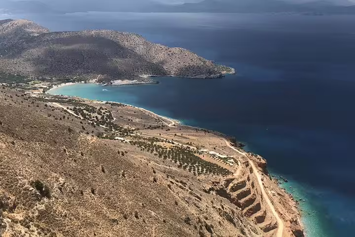 Marvel at the breathtaking aerial view of Vai's rugged coastline and azure waters on the North Coast Adventure Tour.