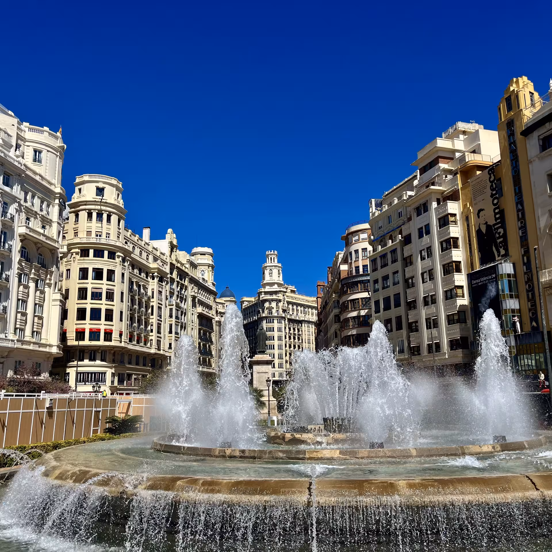 Plaza del Ayuntamiento fountain and historic buildings in Valencia, featured on Leyendas Locales walking tour