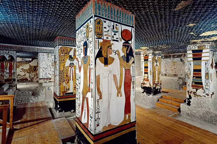 Colorful painted pillars inside a Valley of the Queens tomb, Luxor day tour by bus from Hurghada