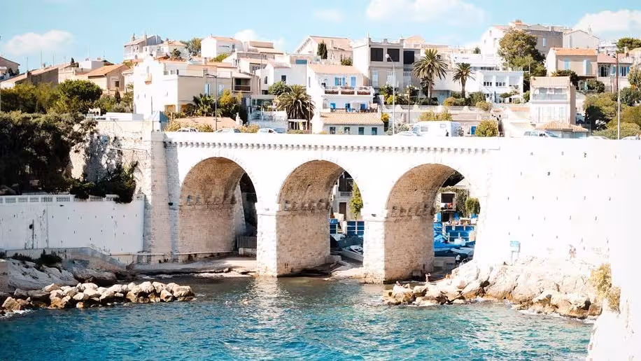 Stone arches at Vallon des Auffes by the sea on the Urban Hiking Marseille tour from St. Victor Abbey