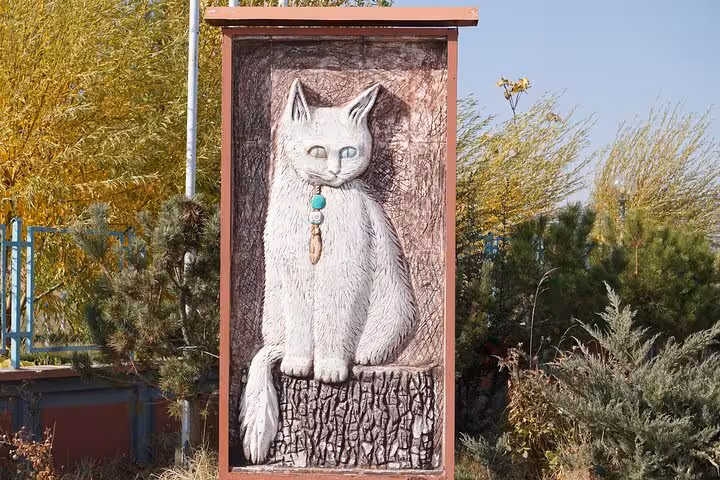 Van cat statue in a garden park, a cultural stop on an all-inclusive private guided 3-day tour of Van, Turkey