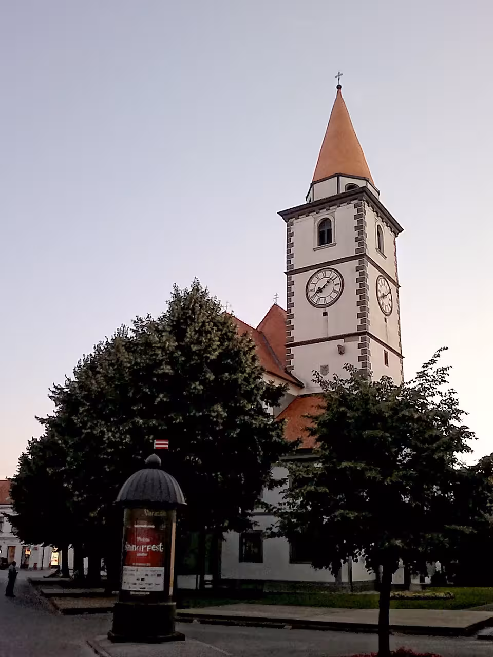 Varazdin Cathedral clock tower at dusk, historic baroque landmark on Trakošćan Castle and Varazdin tour