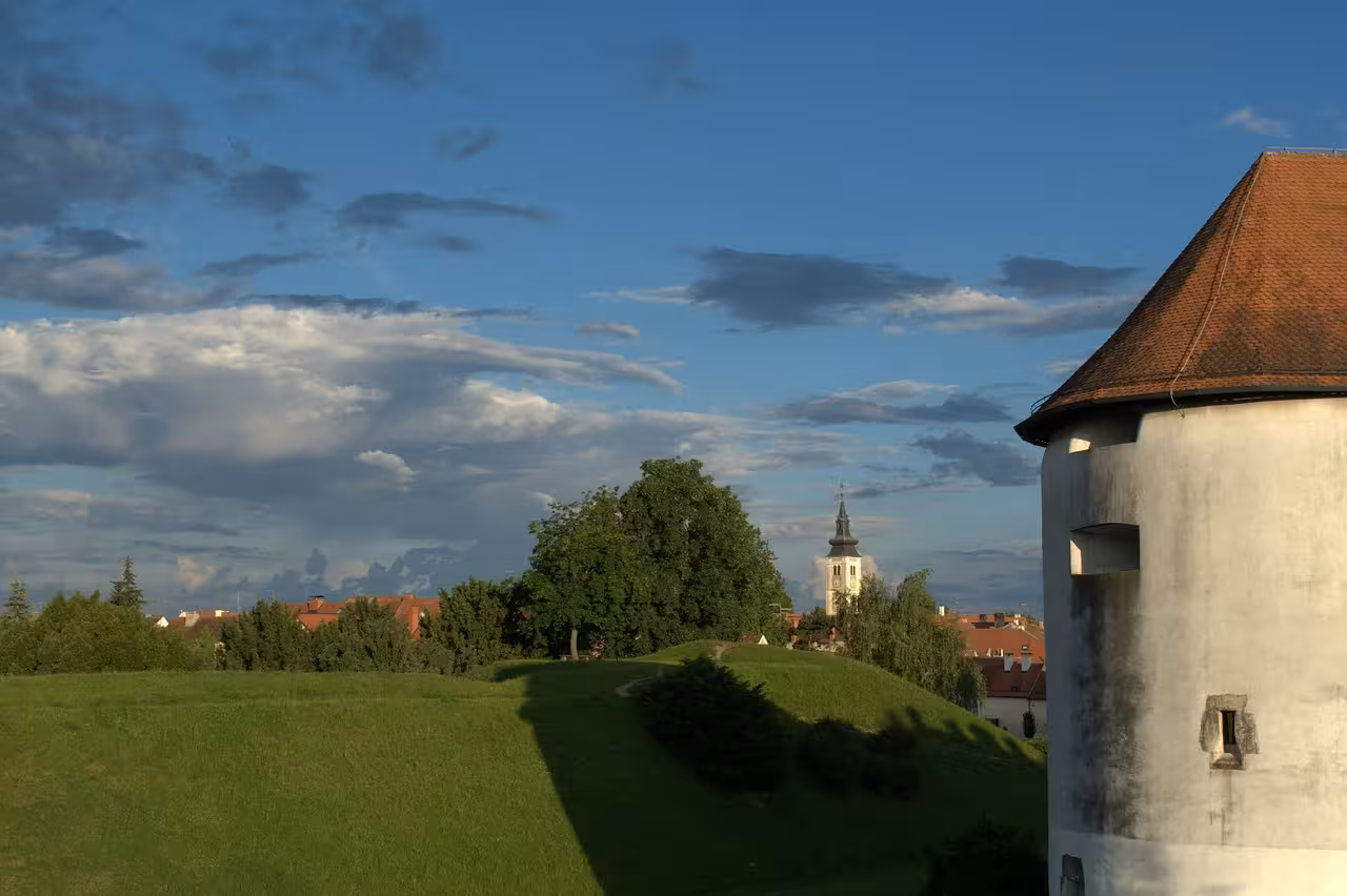 View from Varaždin Old Town fortress toward historic city rooftops and cathedral spire, Croatia day trip