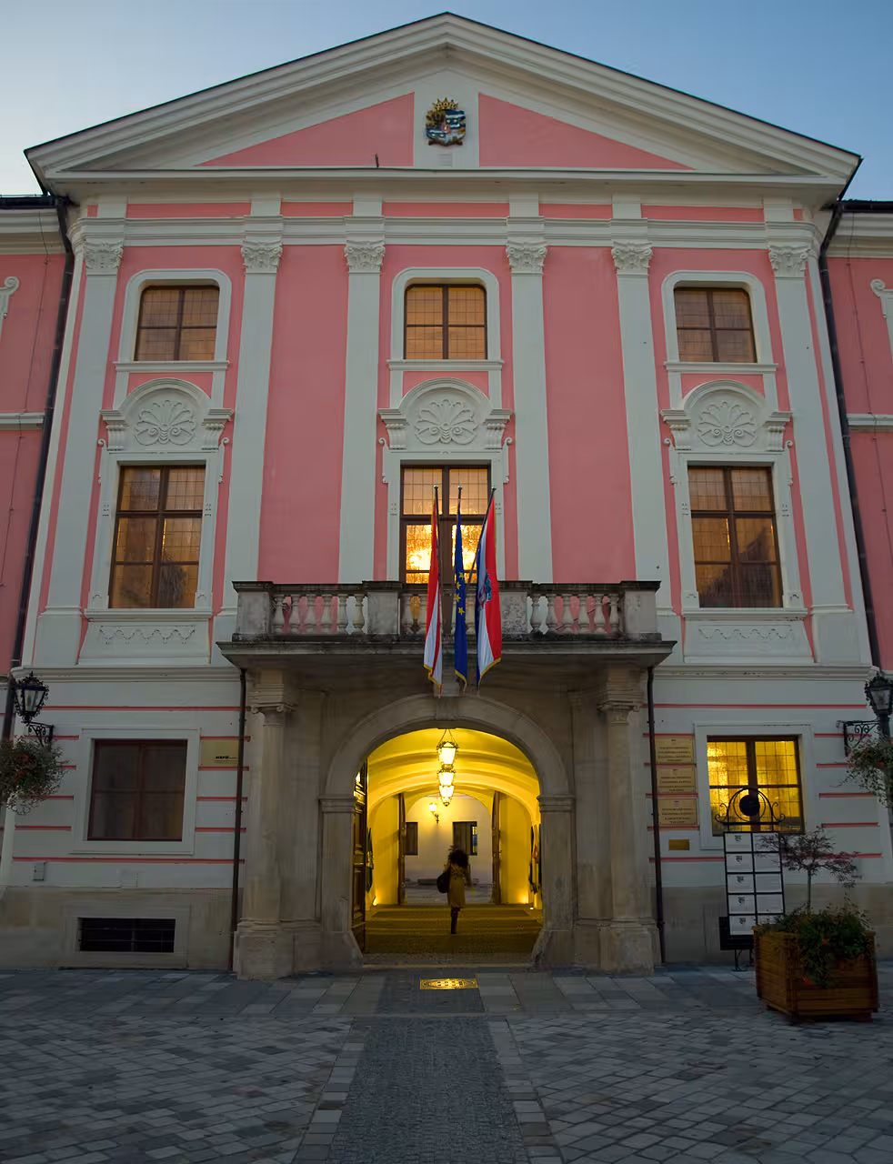 Varazdin Town Hall facade at dusk, baroque architecture stop on Trakošćan Castle & Varazdin day tour