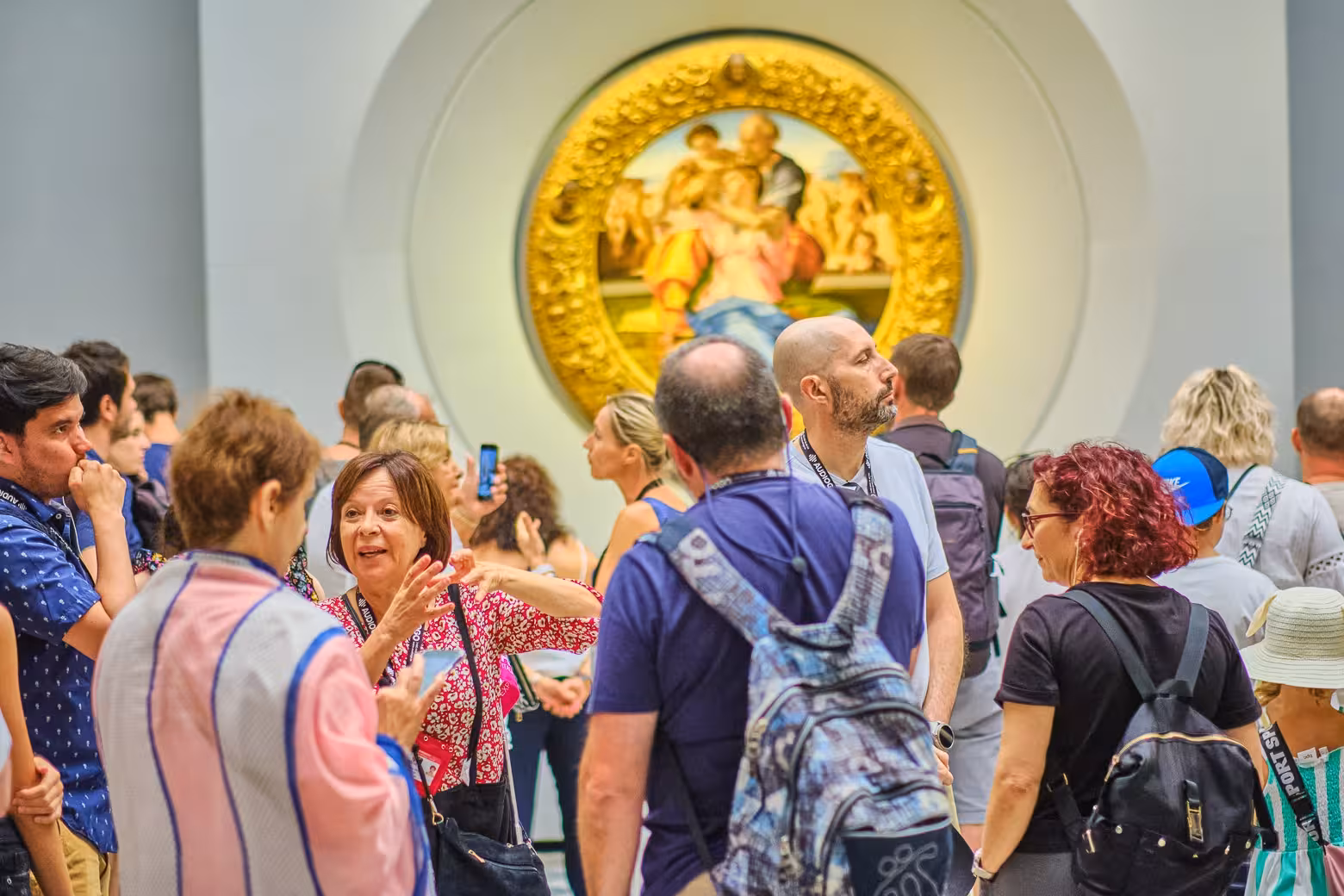 Visitors engage with art and guides inside the Uffizi Gallery on the private Vasari Corridor and Uffizi tour experience.