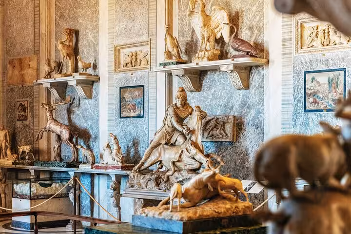 Exquisite sculptures in a Vatican Museum gallery, highlighting art on a private tour.