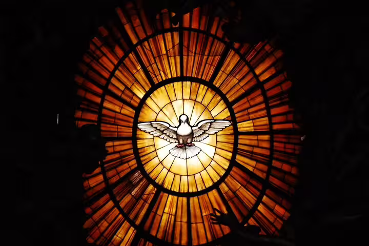 Stained-glass Holy Spirit dove in Vatican Museums on exclusive Vatican tour with expert guide in Rome