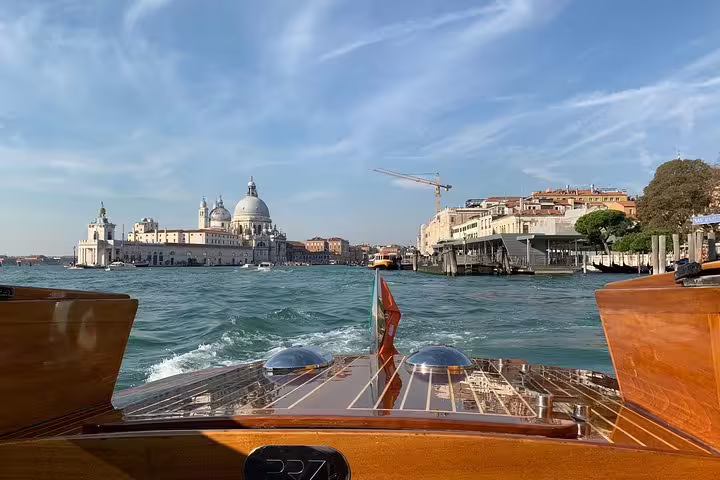 Private transfer from Venice Airport to Venice city center hotel by luxury water taxi on the Grand Canal