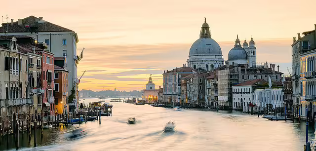 Grand Canal at sunrise with Santa Maria della Salute, classic view on 2-day Venice trip from Rome private tour