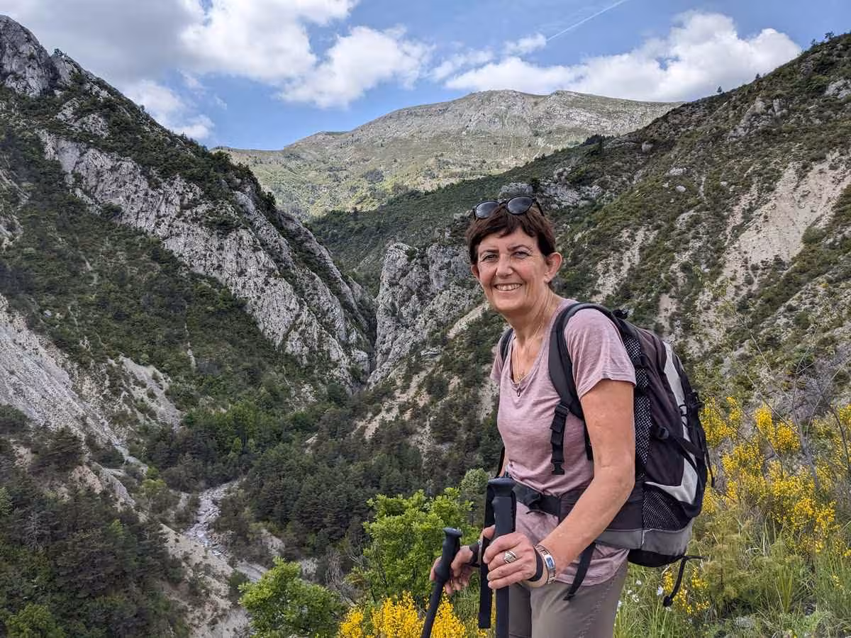 Hiker overlooking Verdon Gorge cliffs on a 6-day French Grand Canyon trekking tour in Provence, France