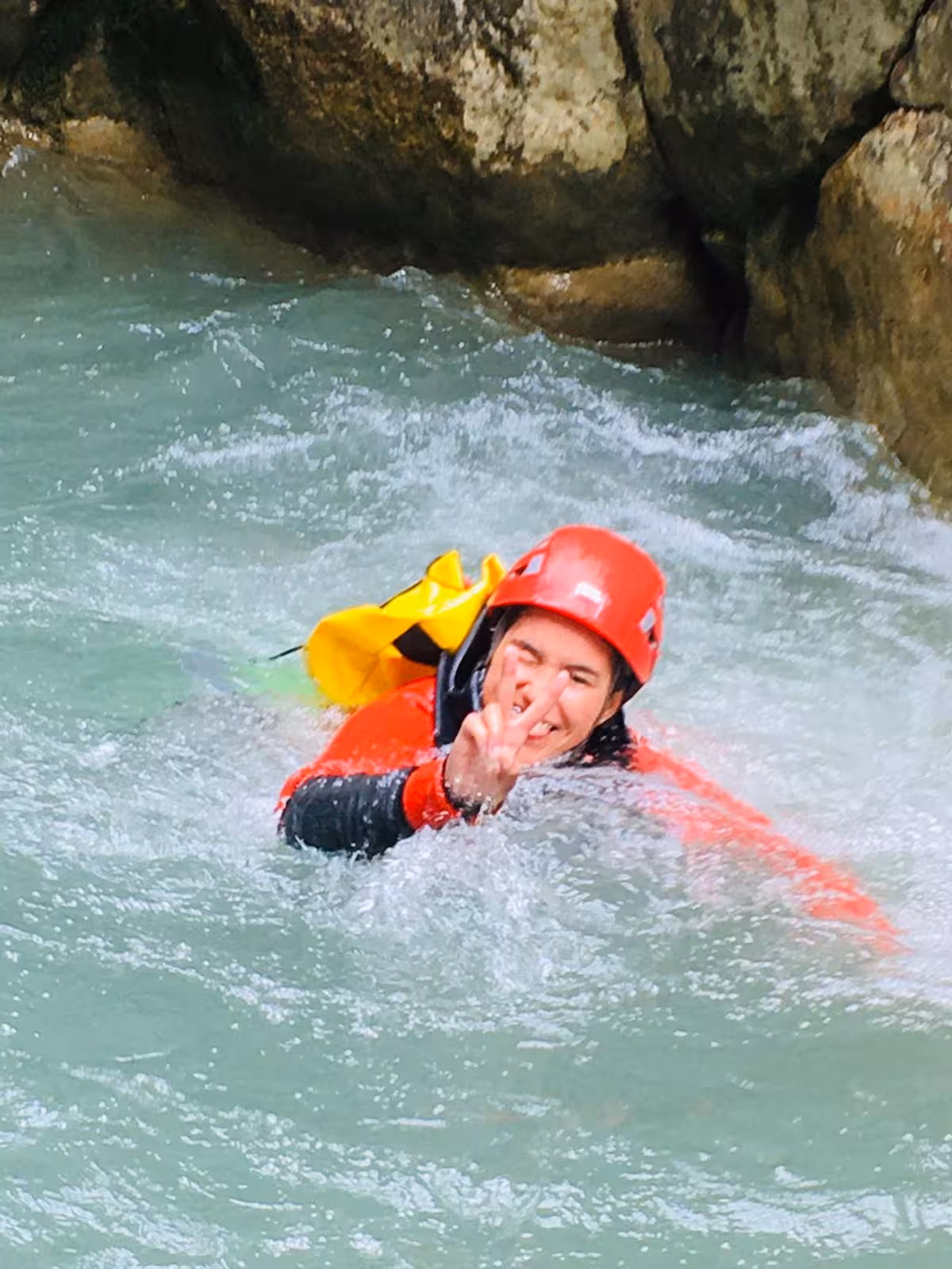 Canyoning in Verdon River rapids, swimmer in helmet and wetsuit on 6D/5N hotel adventure trip in France