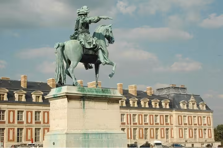 Equestrian statue outside Palace of Versailles, a highlight on the guided garden and palace grand tour