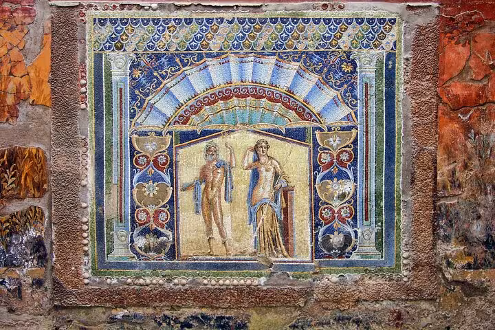 Colorful ancient mosaic depicting mythological figures at an archaeological site near Mount Vesuvius.