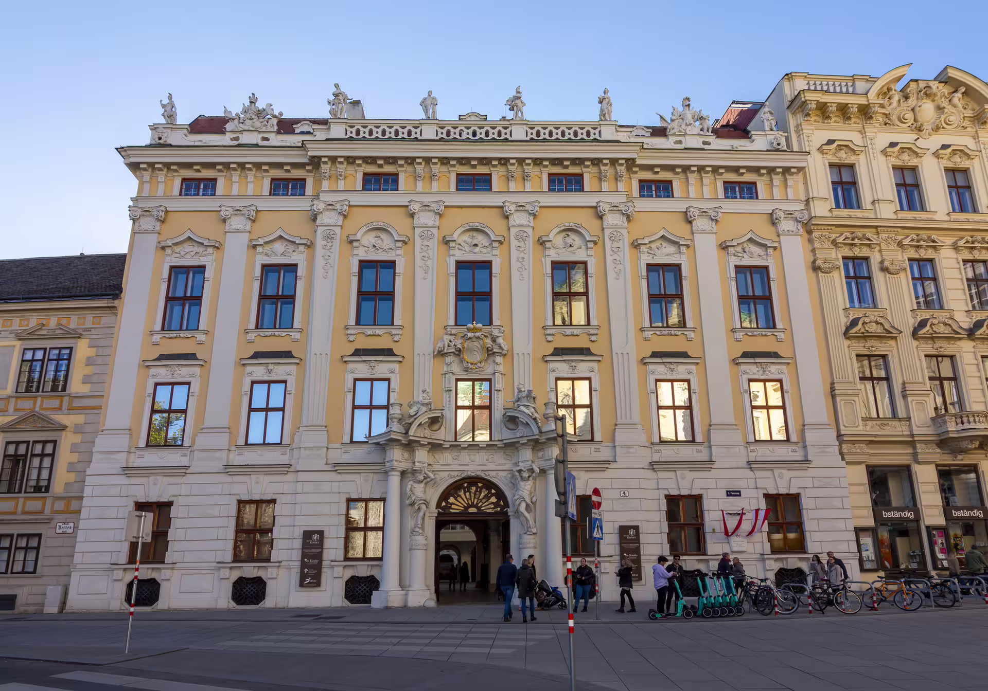 Vienna Historic Centre 1-day walking tour audioguide stop at elegant Baroque palace facade in the old town