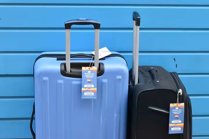 Suitcases with Stasher tags for Vienna Central Station luggage storage, safe short-term bag drop service