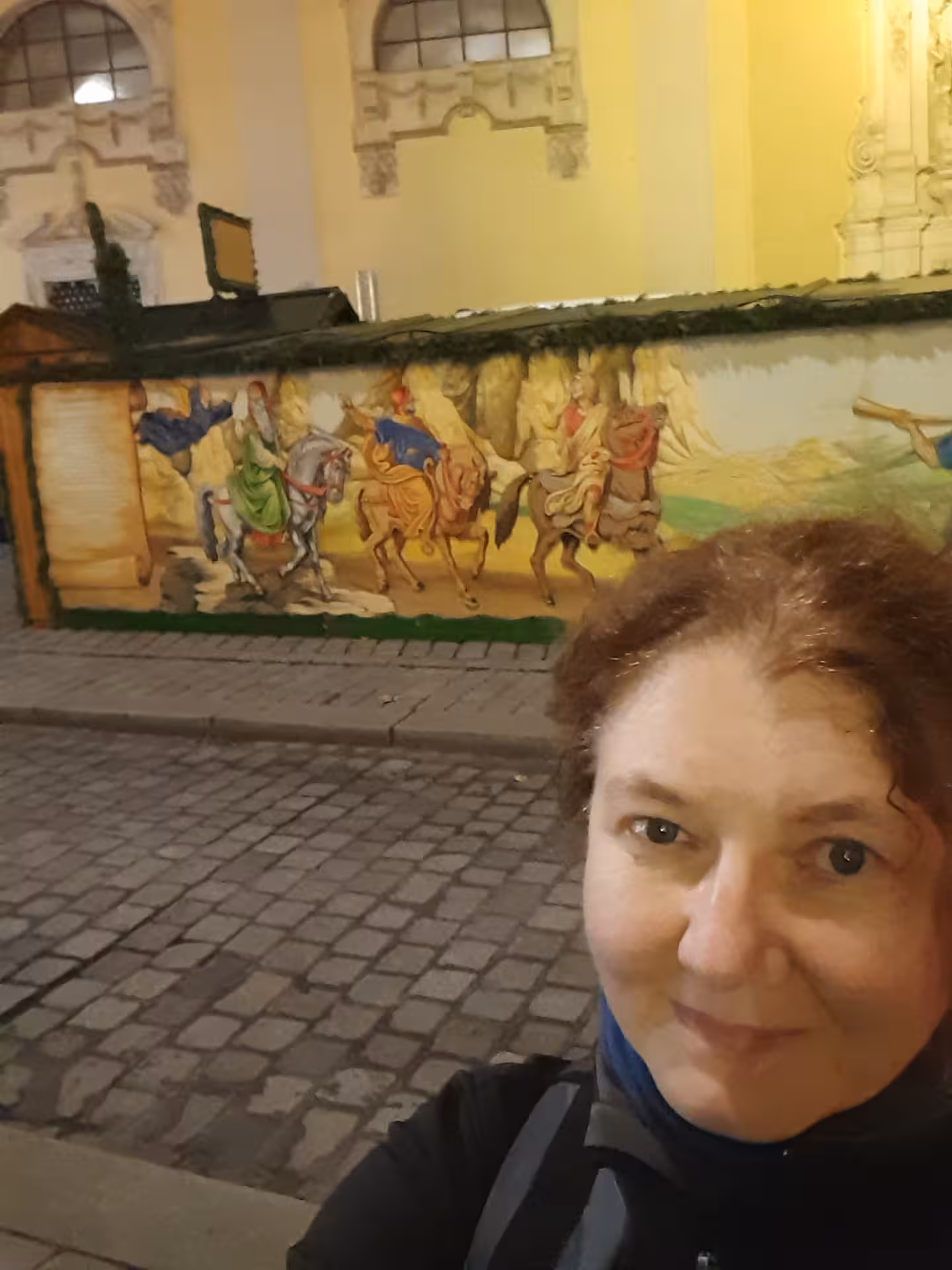 Vienna Christmas tour stop by a historic mural alleyway, highlighting festive heritage on a guided walk