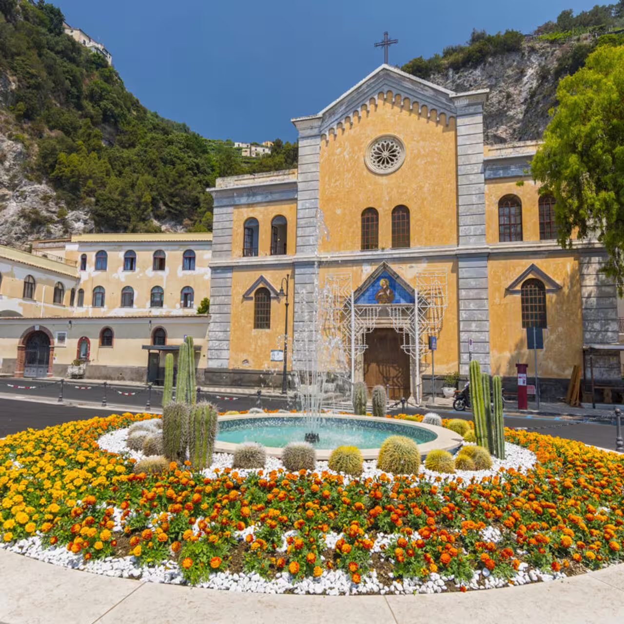 Vietri sul Mare church and fountain, colorful flowerbeds on a private Amalfi Coast tour from Naples