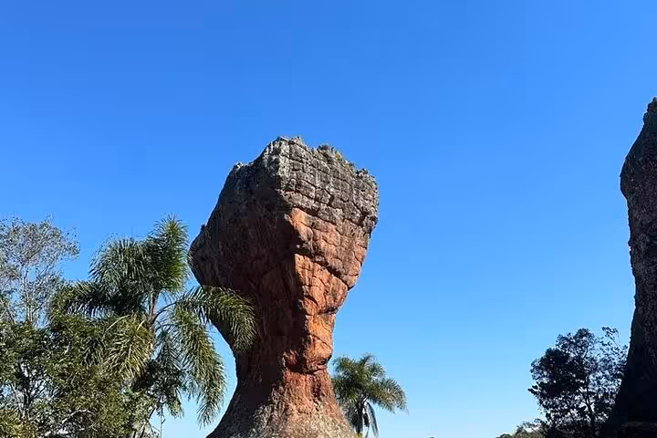 Iconic sandstone formation under a clear blue sky in Vila Velha Park, showcasing unique geological features.