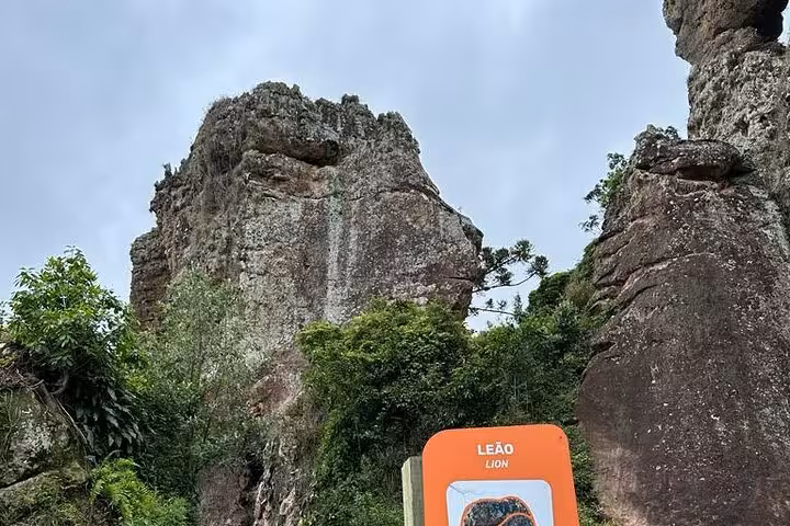 Majestic rock formations labeled 'Lion' at Vila Velha State Park, showcasing the park's unique geological wonders.