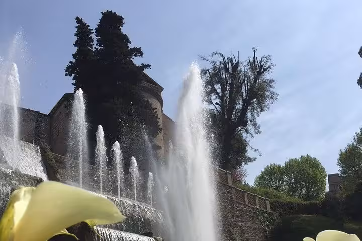 Villa d’Este gardens in Tivoli with tall fountain jets and terraces, full-day Rome tour to UNESCO villas