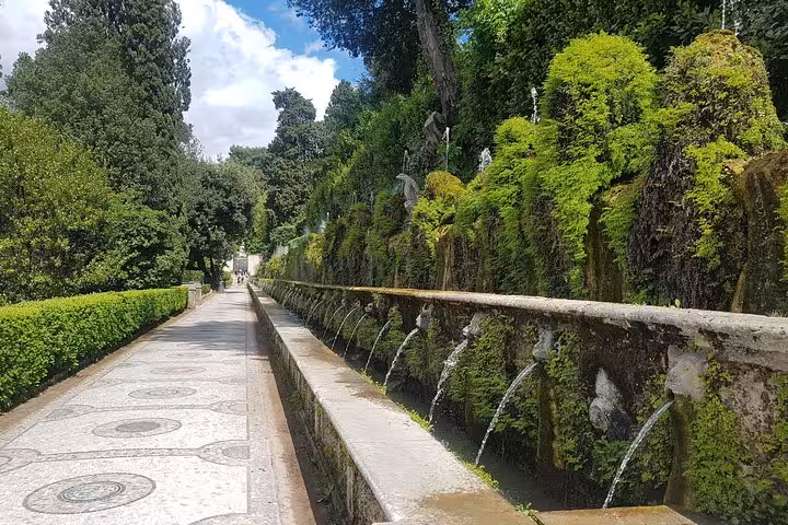 Avenue of the Hundred Fountains at Villa d’Este, Tivoli gardens, on a half-day trip from Rome