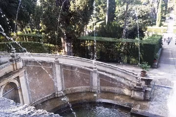 Curved terrace and water jets at Villa d’Este Tivoli gardens, scenic stop on half-day guided tour from Rome