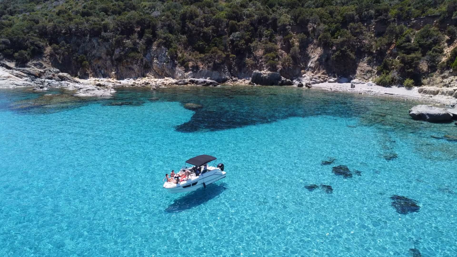 Explore crystal-clear waters on a private boat tour from Villasimius, perfect for Sardinia coastal adventures.