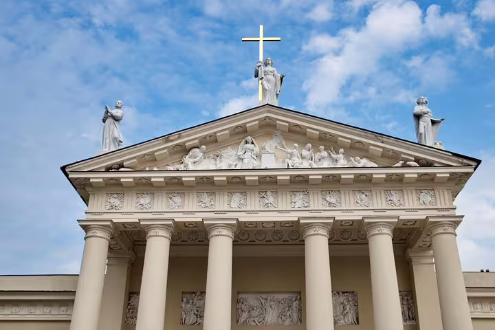 Vilnius Cathedral facade with columns and statues, key stop on Vilnius scavenger hunt self-guided tour
