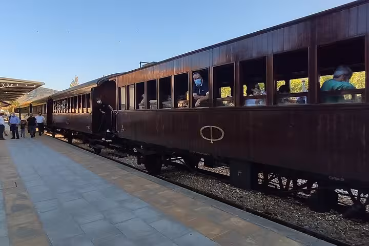 Vintage train at Pinhão station in the Douro Valley, Portugal, highlighting classic rail travel on a Visit Pinhão tour