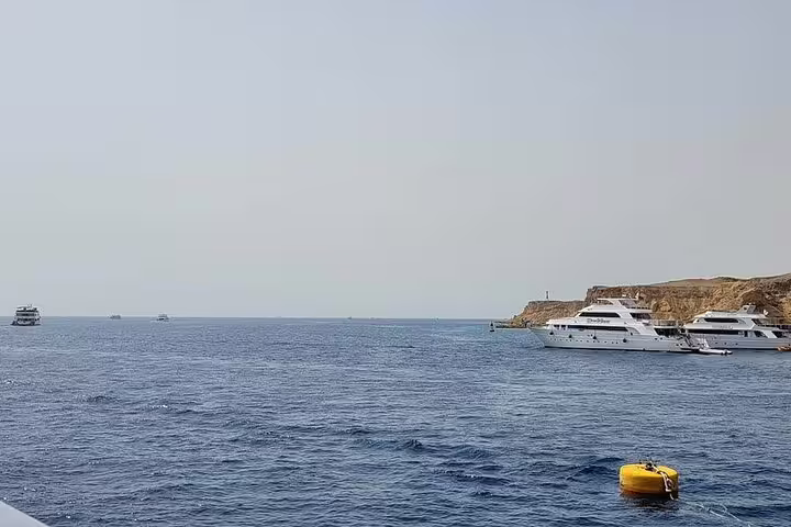 VIP boat cruising near Ras Mohamed National Park, Sharm El Sheikh, with yachts on the Red Sea