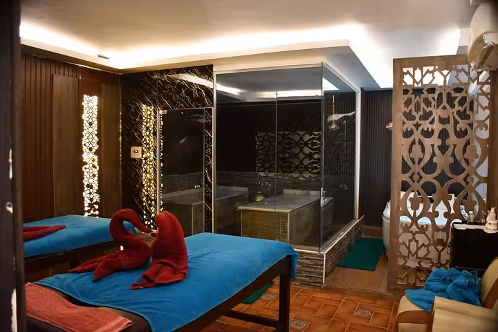 Private couples-style massage room with twin beds and jacuzzi, VIP solo massage experience Sharm El Sheikh
