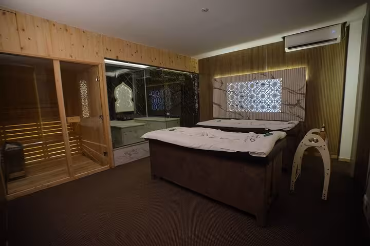 VIP solo massage suite in Sharm El Sheikh with sauna cabin and private treatment bed in a premium spa