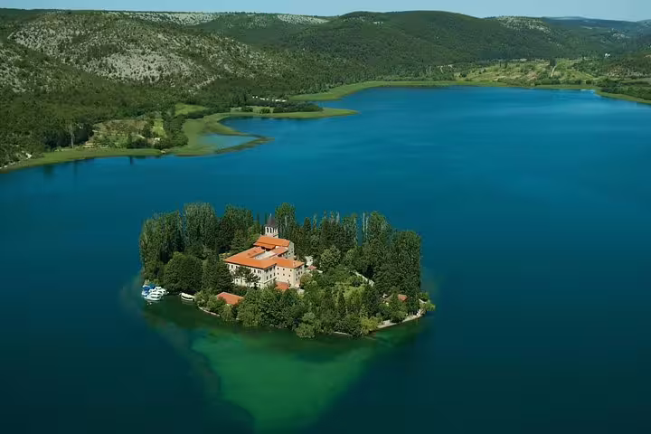 Aerial view of Visovac Island monastery on Krka River lake, highlight of Krka National Park tour