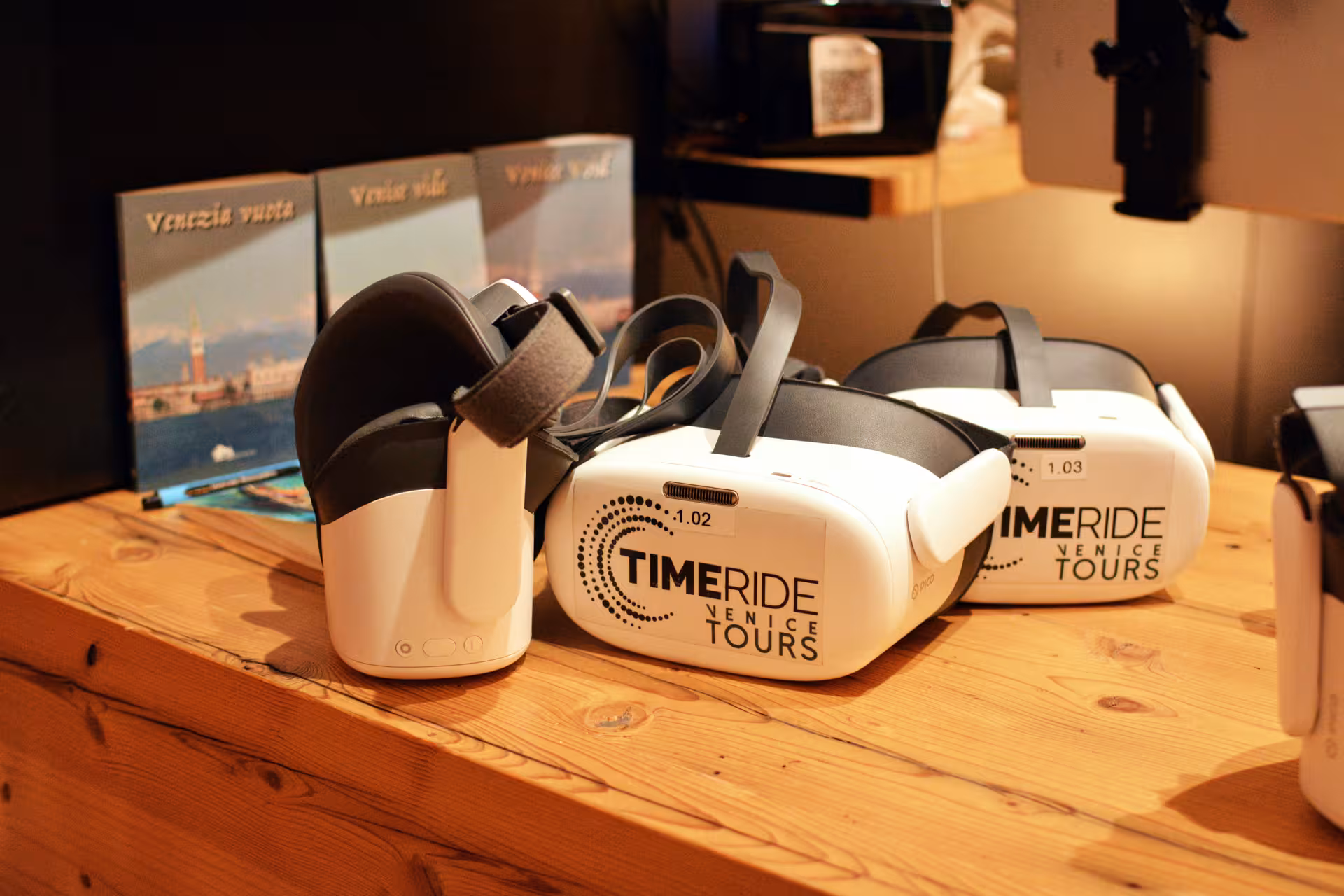 VR headsets for TimeRide Venice Tours on display, showcasing immersive gondola and history experiences.