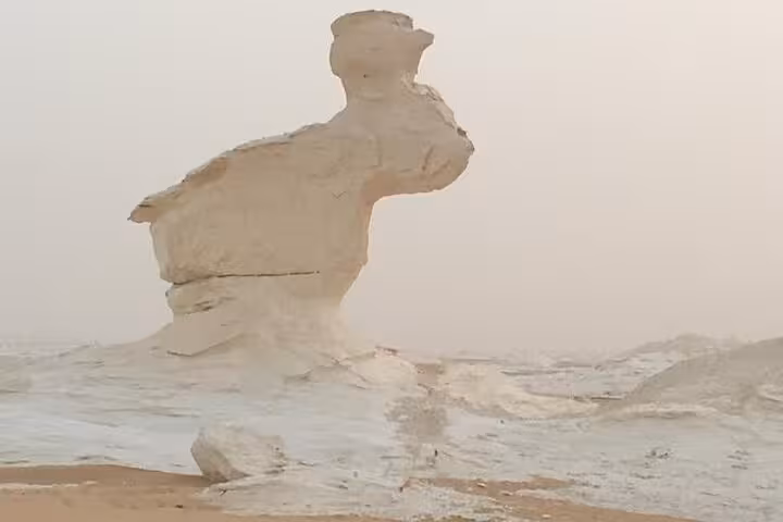 White Desert chalk mushroom rock in Egypt, scenic stop on private 2-day Black and White Desert camping tour