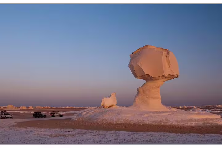 Mushroom limestone formation at sunset in White Desert near Bahariya, Egypt, Siwa 7 days 6 nights trip