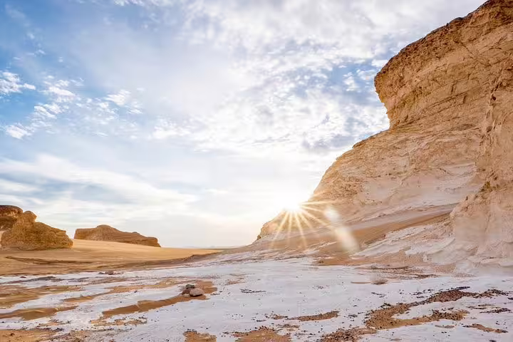 Sunrise over Egypt’s White Desert chalk cliffs, scenic stop on 7 days Siwa and Bahariya oasis tour