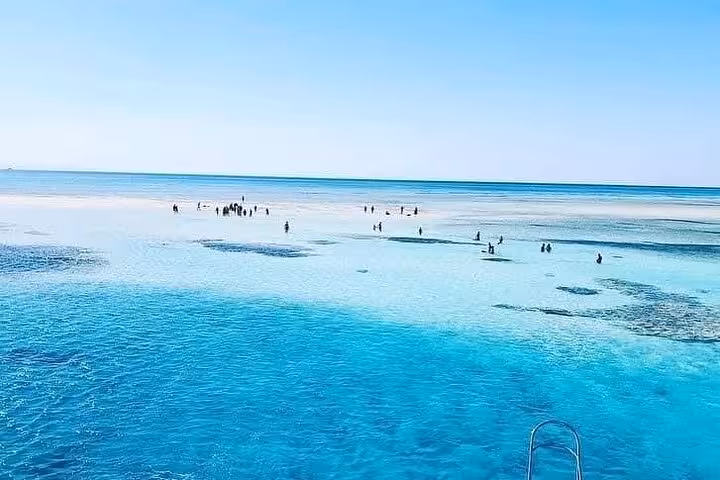 Panoramic view of White Island sandbar and turquoise Red Sea on Ras Mohamed VIP boat snorkeling and diving trip