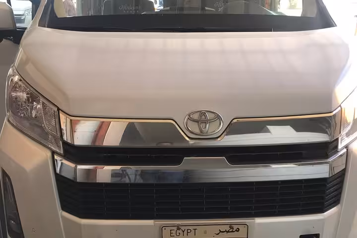 White Toyota van ready for Hurghada transfer, private airport pickup and hotel drop-off with air-conditioned ride