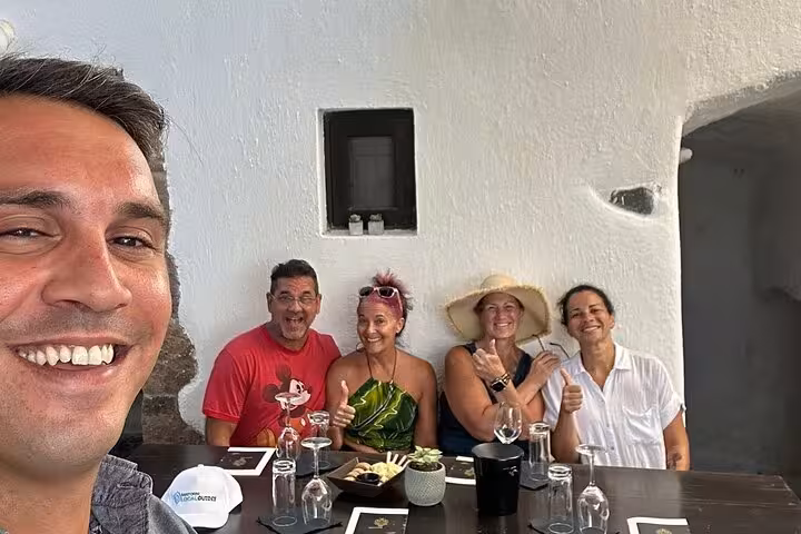 Group at wine museum table tasting local wines with snacks during private 2, 3 or 4 wineries tour