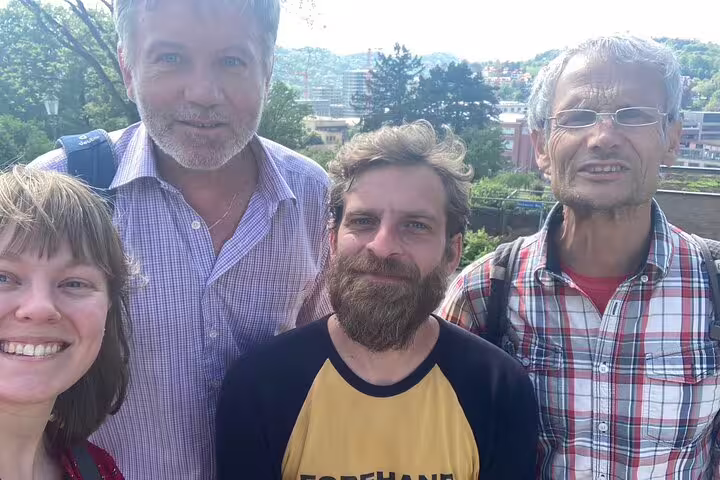 Group selfie with Winterthur city views during a self-guided scavenger hunt and sights walking tour